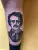 A photo of an Edgar Allen Poe tattoo by Edmonton tattoo artist Sam Aleksandr