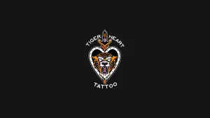 A photo of Tiger Heart Tattoo's logo