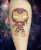 A chibi-style ironman tattoo by Edmonton tattoo artist Nadia Farhat.