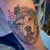 A dog portrait tattoo by Edmonton tattoo artist Nikko Clifton.