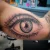 An eye tattoo by Edmonton tattoo artist Conrad Plews.