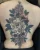 A floral backpiece tattoo by Edmonton tattoo artist Sasha Day.