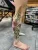 A floral leg tattoo by Edmonton tattoo artist Kaisha Nolin-Farkouh.