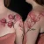 A floral branch tattoo by St. Albert tattoo artist Jiva.