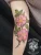 A floral tattoo by Edmonton tattoo artist Marcy Nielsen.