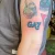 A lettering GAY tattoo by Edmonton tattoo artist Cheyanne Marie.