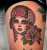 A lady face floral tattoo by Edmonton tattoo artist Justin McGee.