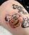 A snoopy on a pumpkin tattoo by Edmonton tattoo artist Breanna.